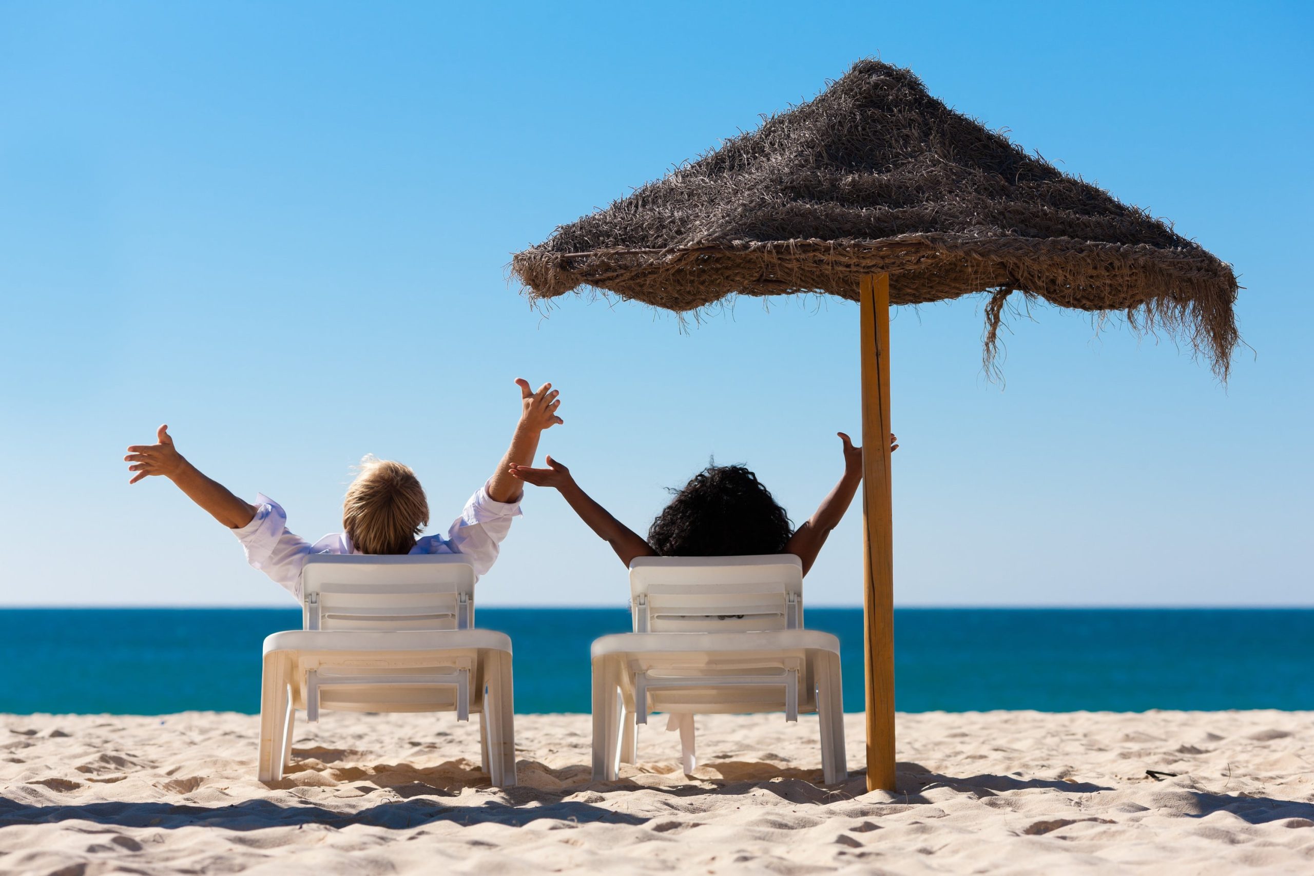 a person sitting at a beach